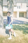 シャツ¥16,500、スカート¥14,300、ポーチ¥8,250/ジャックバニー シューズ¥11,990/ティゴラ