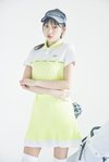 シャツ¥12,100、スカート¥14,300、バイザー¥4,950、ソックス¥2,860、シューズ¥14,850、ポーチ¥4,400、キャディバッグ¥22,000/ニューバランス ゴルフ