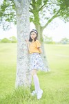 シャツ¥20,900、スカート¥27,500/RLX GOLF シューズ¥11,990/ティゴラ